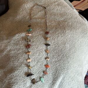 Beautiful heishi necklace with multiple stone animals